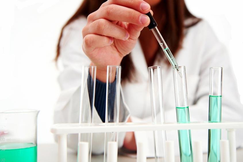 medical professional with test tubes