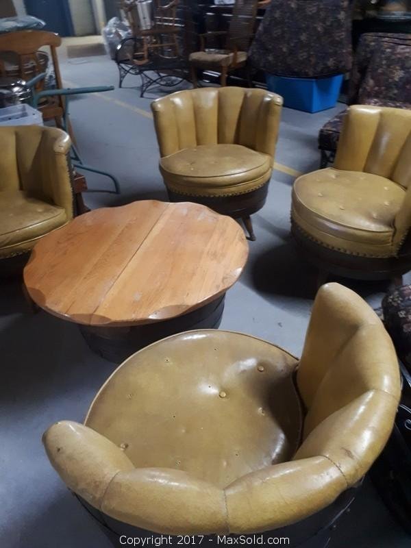 1960's 4 genuine swivel barrel chairs and coffee table set. Leather (see pictures). Coffee table top opens for storage. chairs 27""x27"". Table 30""x18"" Very Heavy